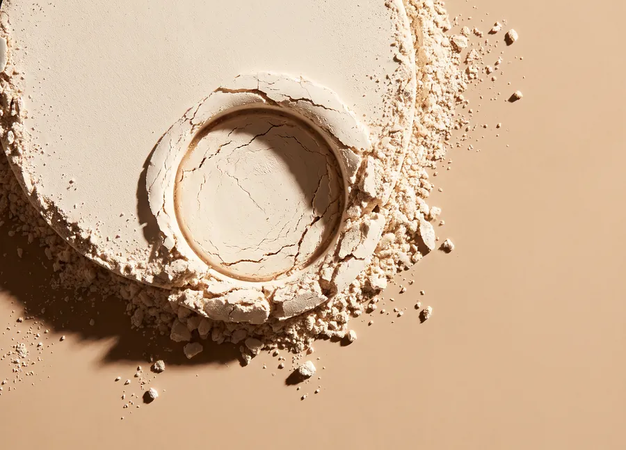 A pressed disc of blended powder, photographed from above